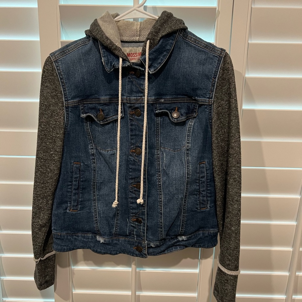 Blue Jean jacket with a hood.